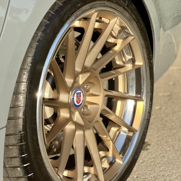 Gold HRE Wheel on a luxury vehicle